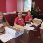 Jeannie Miller Brodhead, Ivey Lambert Sewell and Patricia Hatcher Shook working Registration-Name Tag Table