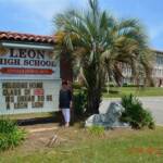 Leon High School with Billie Roberts Padgett by sign.jpg
