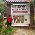 Vivian Miller in front of Leon sign.jpg